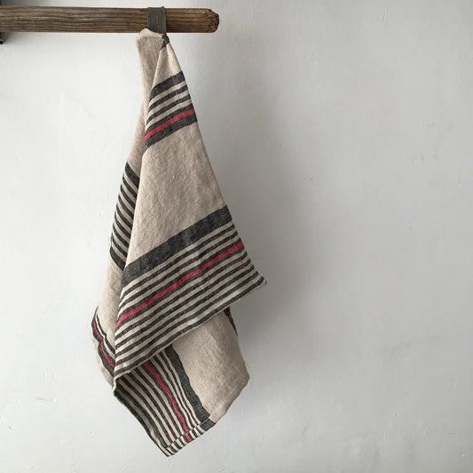 Paños de cocina Marsella de lino rayado de colores natural, negro y rojo.