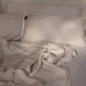 Funda de almohada de lino bicolor, blanca y natural.dE.LENZO