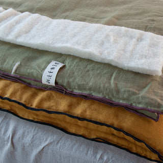 Edredónes para pie de cama de lino y lana