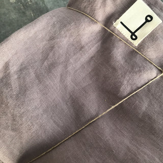Funda de almohada de lino de color Malva